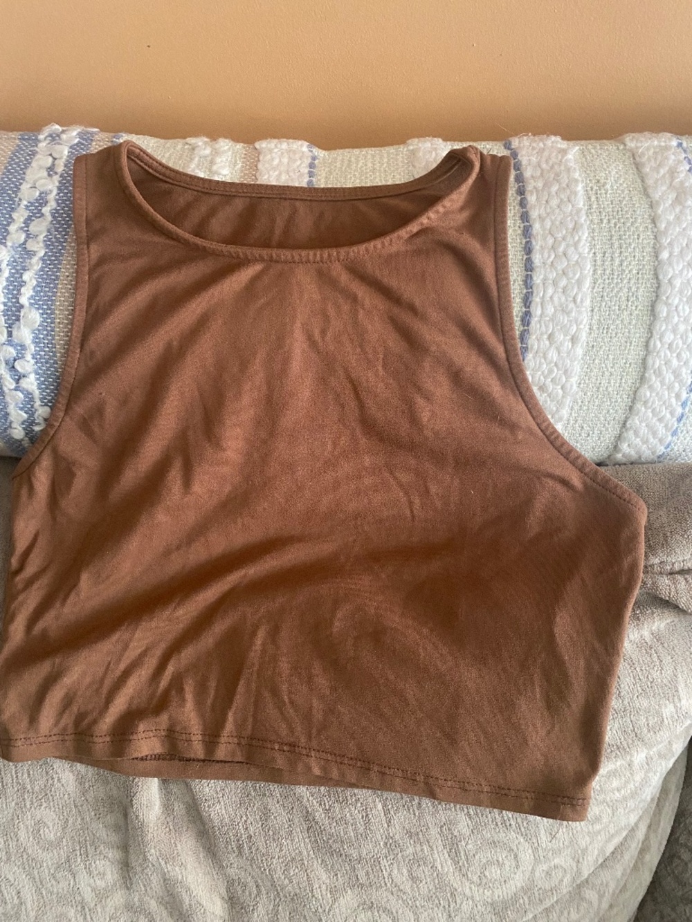 Brown sleeveless shirt to
